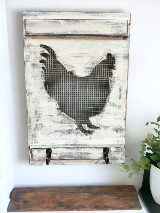 Farmhouse-inspired wall hook rack with rooster design, ideal for hanging aprons or utensils in the kitchen