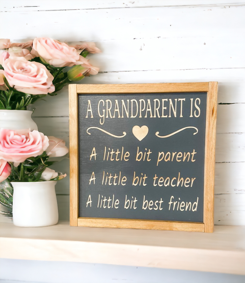 Handmade gray carved wood sign with the quote “A grandparent is a little bit parent, a little bit teacher, and a little bit best friend” – thoughtful gift for grandparents