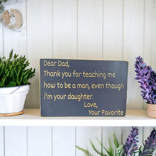 Wood sign that reads “Dear Dad, Thank you for teaching me how to be a man, even though I’m your daughter” — heartfelt gift for dad from daughter with thoughtful quote.