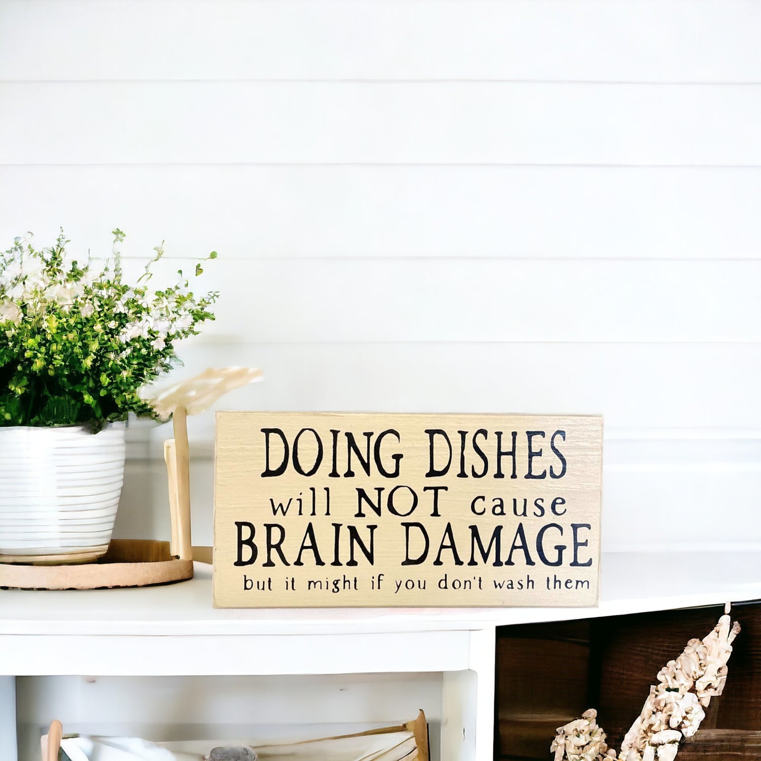 Funny kitchen wood sign with the message 'Dishes will not cause brain damage but it might if you don't wash them