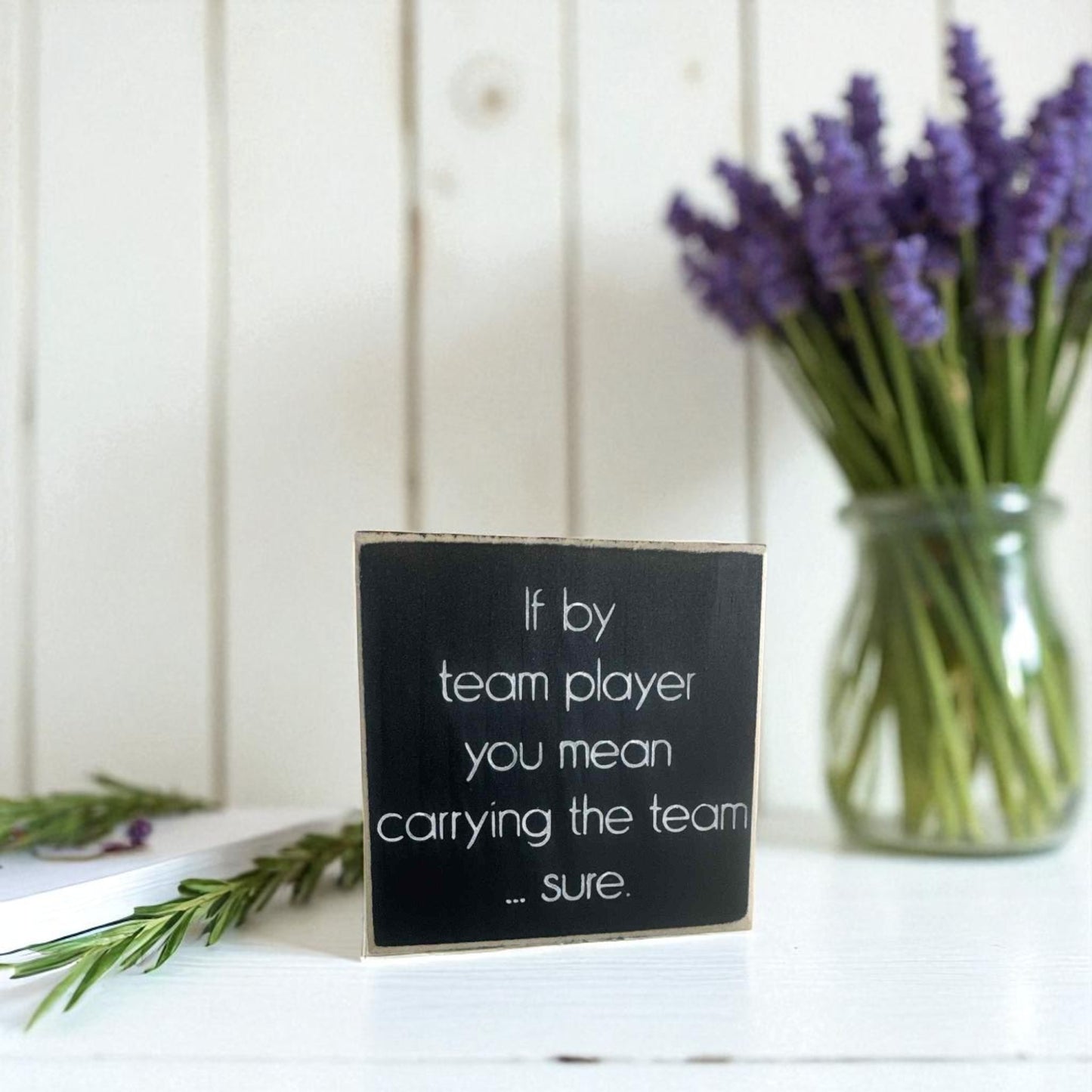 Handmade funny office desk sign reading “If By Team Player You Mean Carrying the Team… Sure” – sarcastic office decor, 4.5" x 4.5" wood block, witty workplace gift.