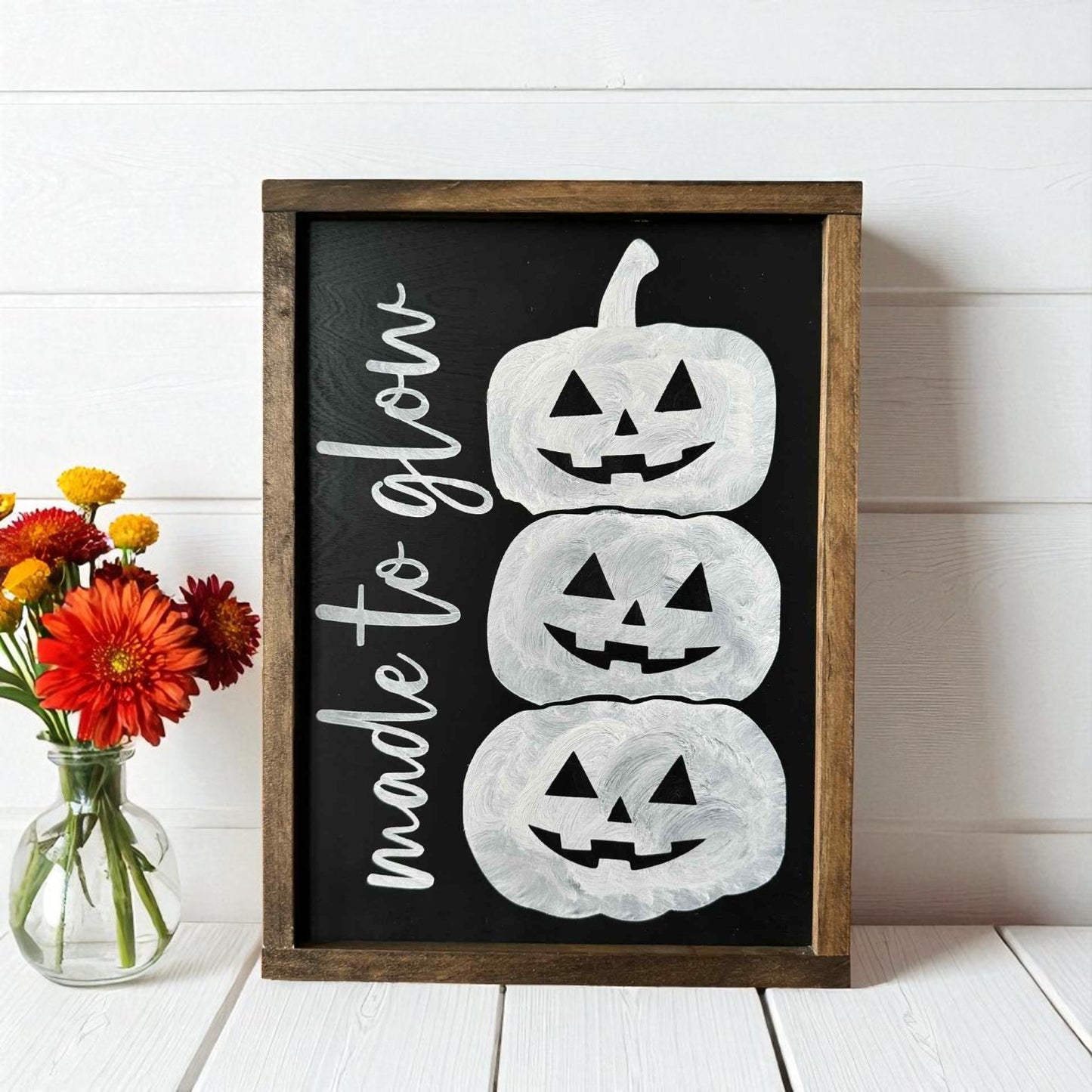 Framed wood Halloween sign with stacked jack-o’-lanterns and Made to Glow text – cute rustic Halloween decoration