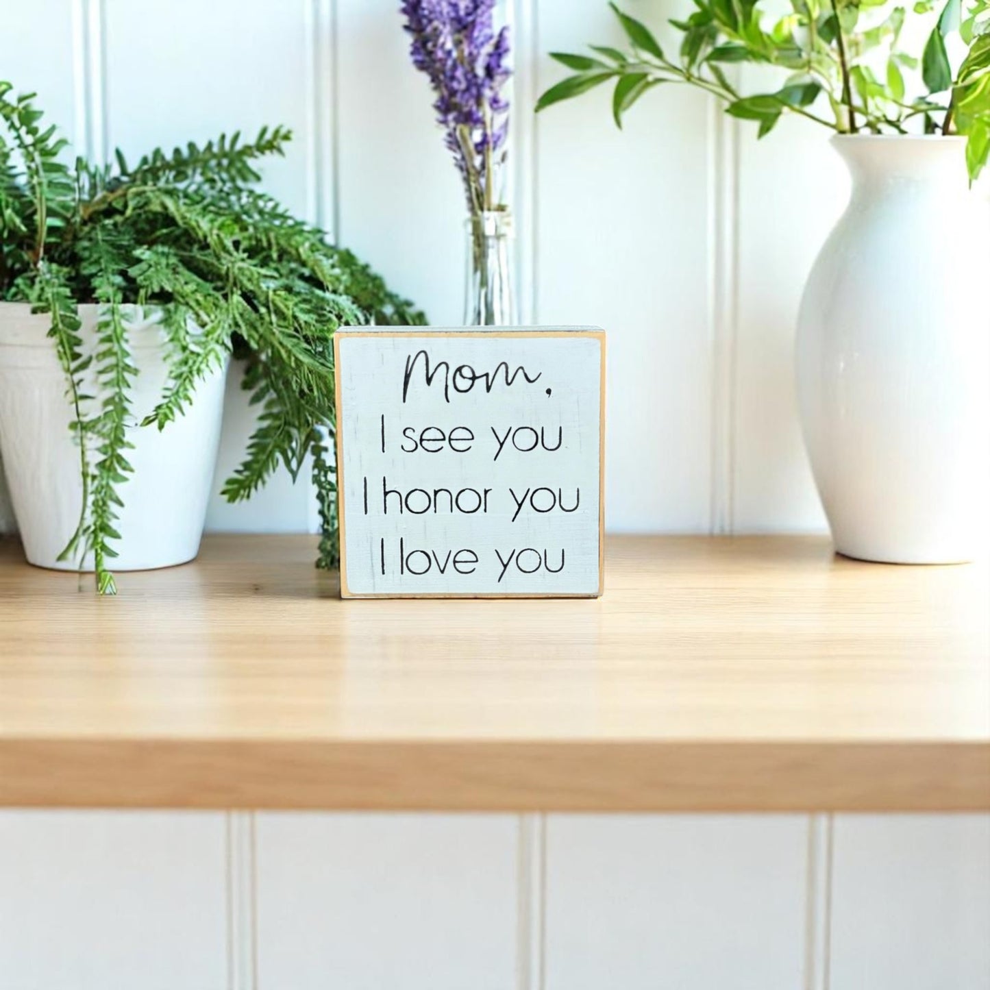 Handcrafted white wood block sign with black text that reads, "Mom, I see you, I honor you, I love you" – meaningful for mom gift.