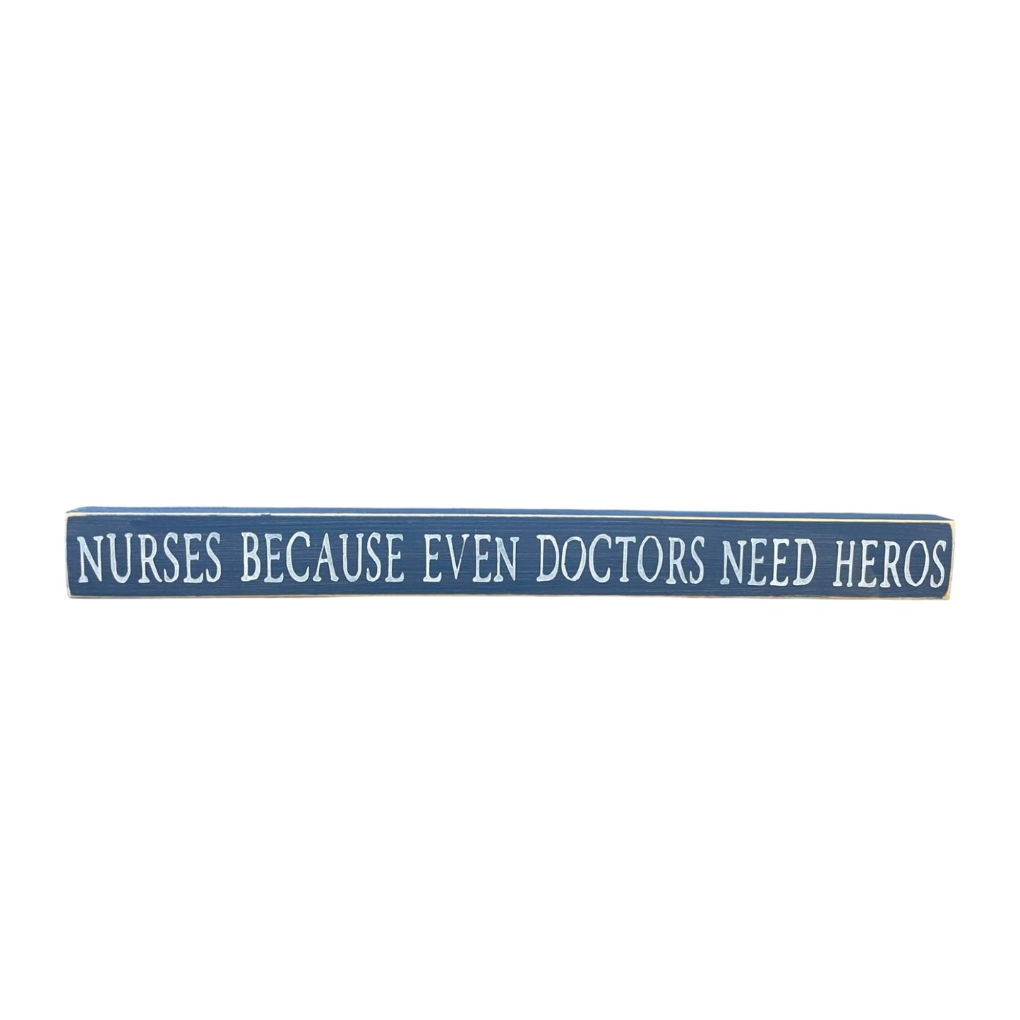 Handpainted bluish-gray wood sign with white text reading 'Nurses Because Even Doctors Need Heroes,' freestanding 16-inch gift decor for nurses.