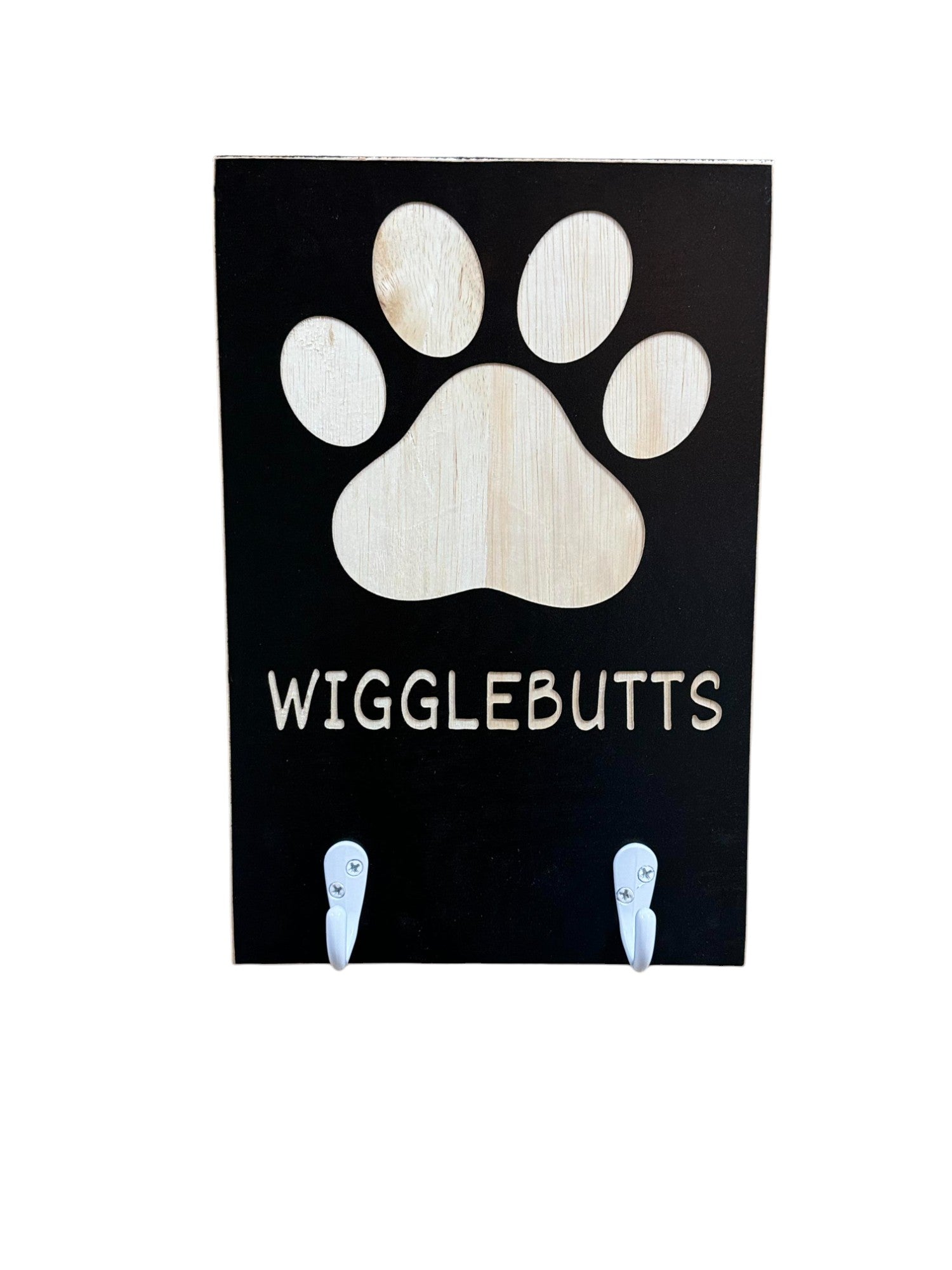 8" x 12" wooden wall hanging that says "Wigglebutts" with white metal hooks – a funny dog quote dog leash holder, perfect for pet lovers.