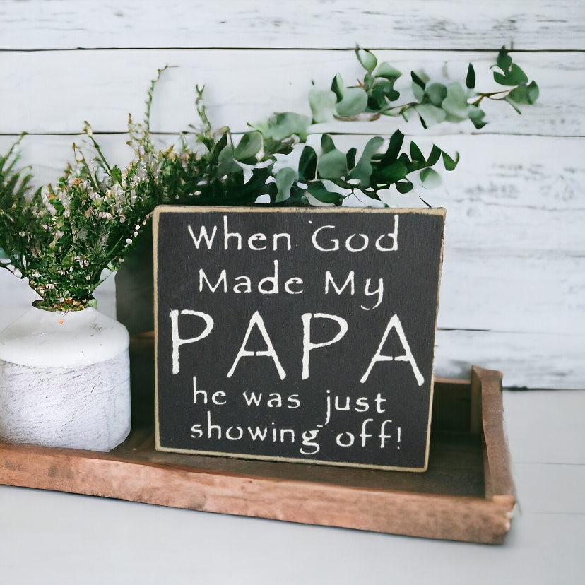 4.5" x 4.5" wood block sign with white text against a black background