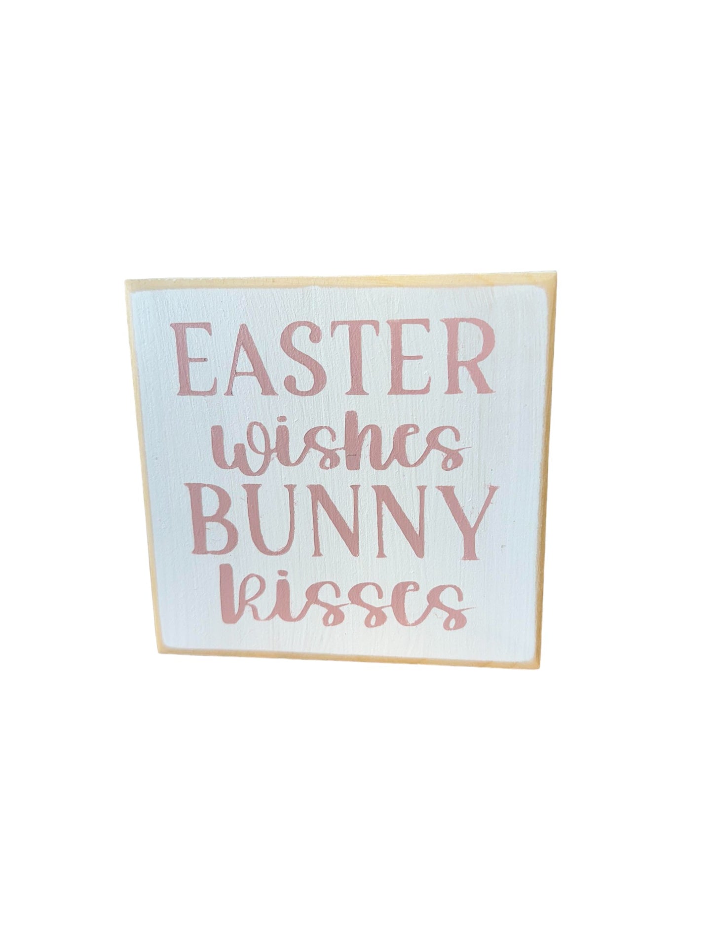 Hand-painted wood sign with 'Easter Wishes Bunny Kisses' in soft pink on a white background, perfect for farmhouse Easter decor
