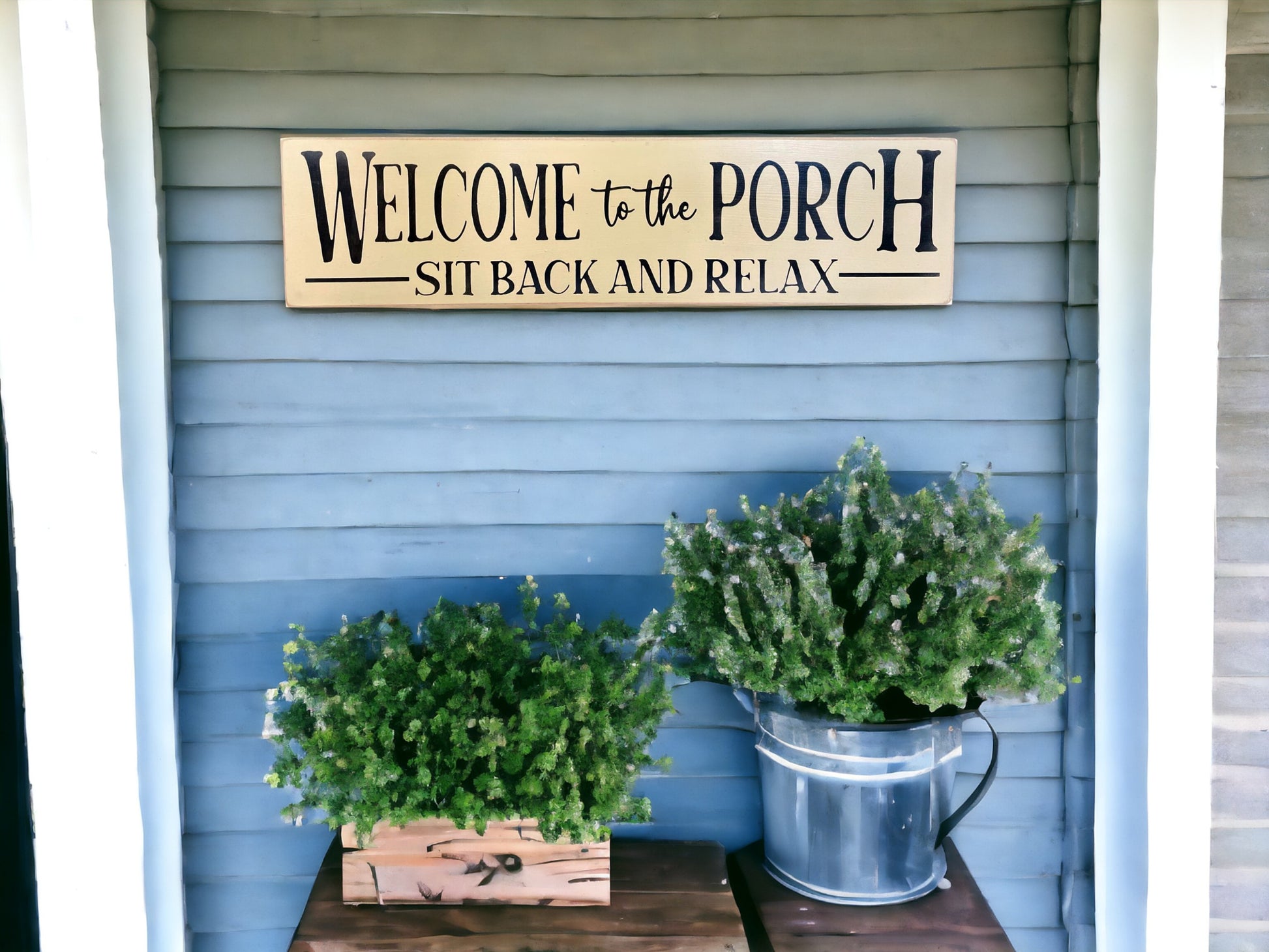 Handpainted wood sign reading 'Welcome To The Porch Sit Back And Relax' with a light cream background and black text, perfect for welcoming guests to your porch.