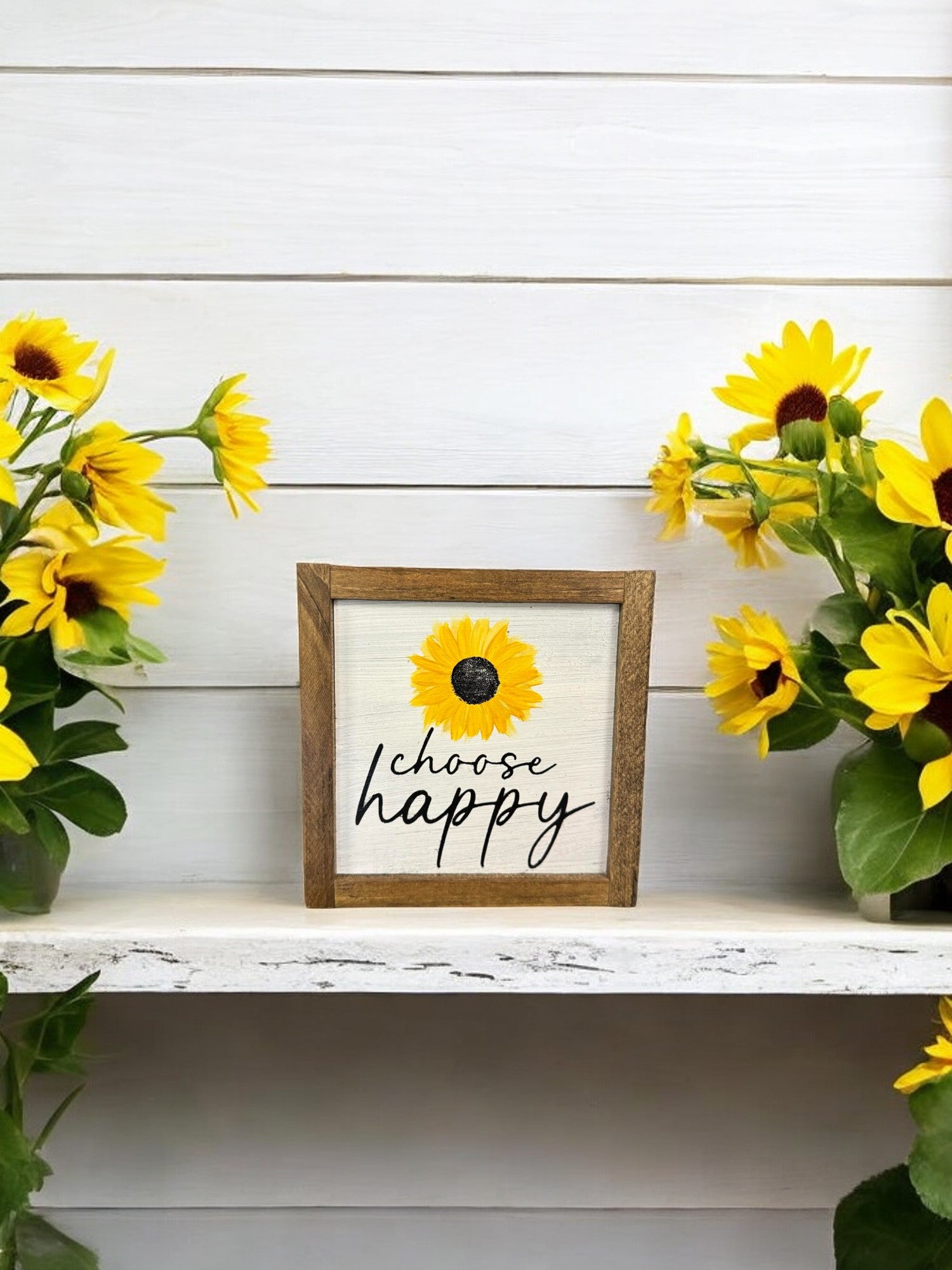 Hand-painted "Choose Happy" 5.5" x 5.5" framed wooden sign with a sunflower design, white background, black text, and a stained wooden frame, serving as inspirational sunflower decor.