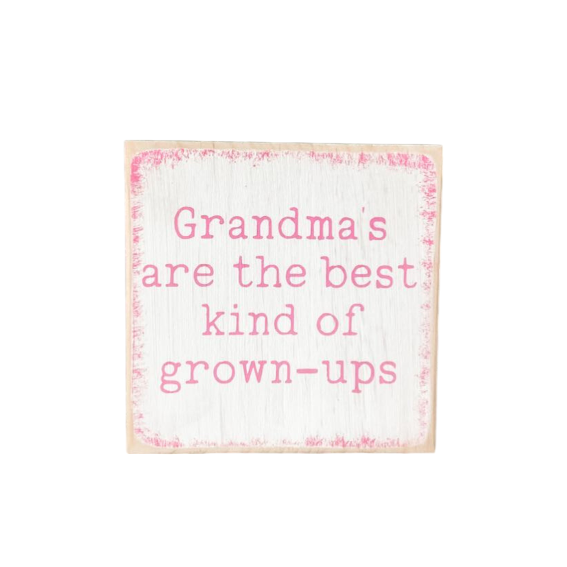 A 4.5" x 4.5" wood sign with a white background, playful pink text, and a vibrant pink border, featuring the message, 'Grandmas are the best kind of grown ups.' This charming grandma sign adds a playful and loving touch to your decor, making it an ideal gift or a delightful addition to your space.