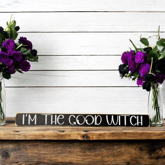 Skinny wooden Halloween sign with "I'm the Good Witch" text, perfect for a witch saying and witch sign on a shelf, mantel, or office.