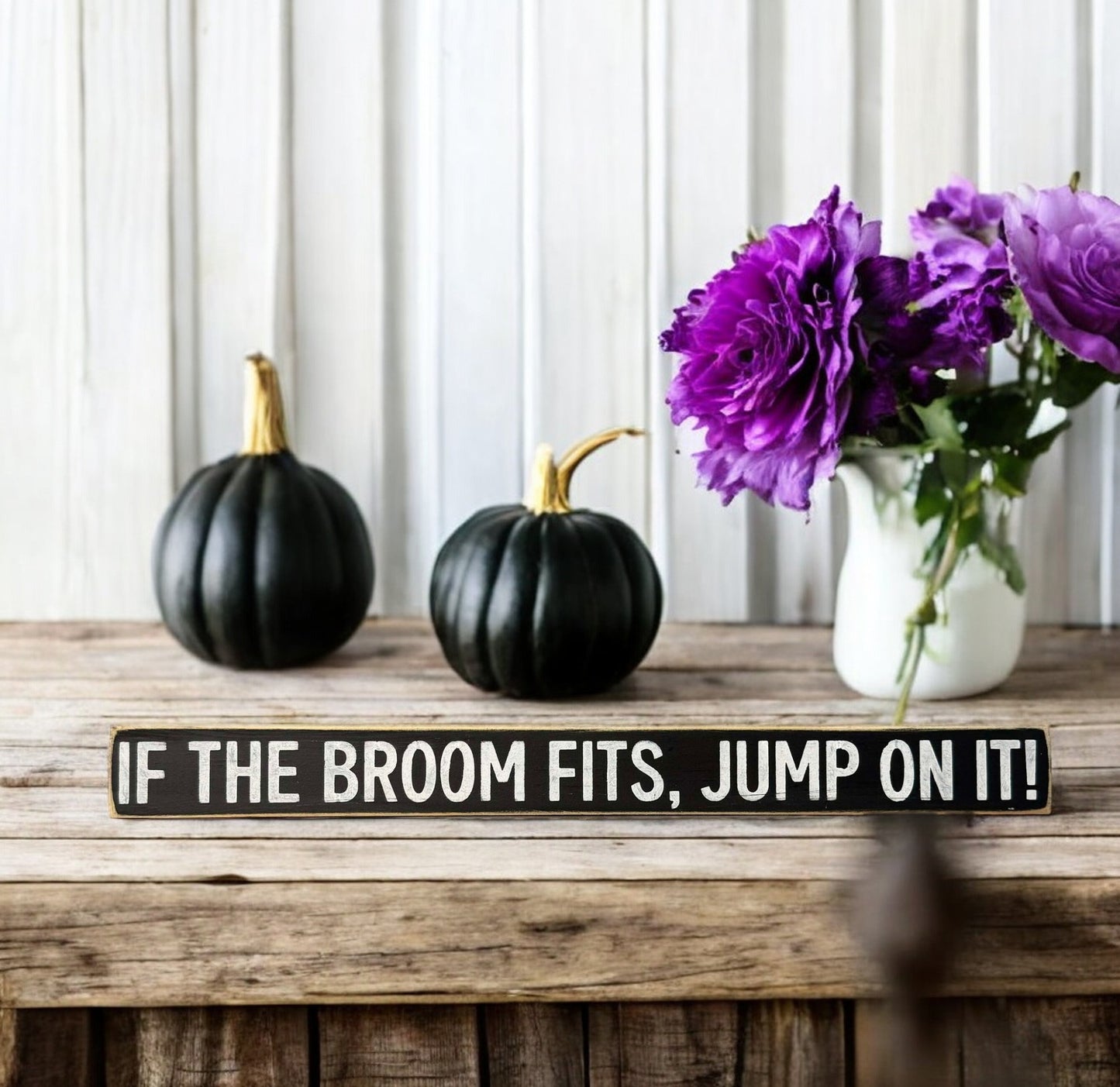 Skinny wooden Halloween sign with "If the broom fits, jump on it!" text, ideal for witch decor on a shelf, mantel, or office.