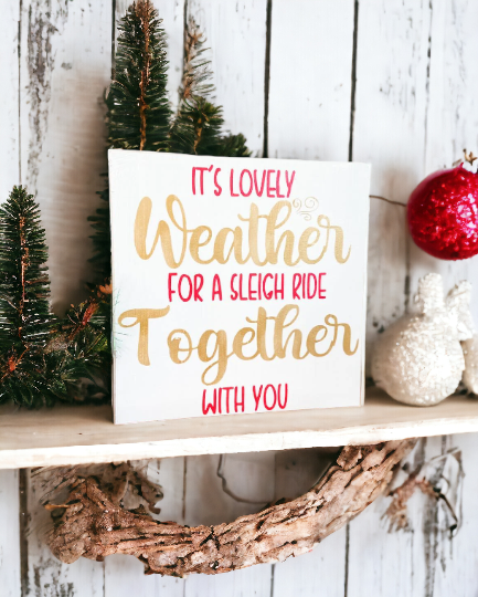 7" x 7" Christmas Sign - 'It's Lovely Weather for a Sleigh Ride Together with You' - White Wooden Shelf Decor with Playful Gold and Red Text - Fireplace Mantel Decor