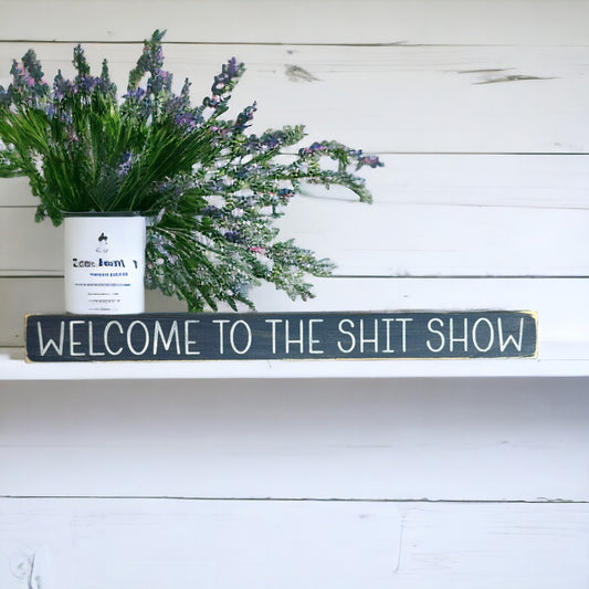 Handpainted bluish-gray wood sign with white text reading 'Welcome To The Shit Show,' freestanding 16-inch funny bathroom decor for shelves and counters.