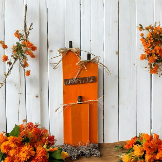 Handcrafted wooden pumpkin decor with a "Pumpkin Patch" sign, ideal for fall porch and mantel decorations.