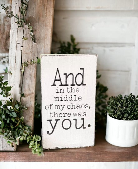 Wood block sign with black text reading 'And in the middle of chaos there was you' against a white background, ideal as a best friend gift