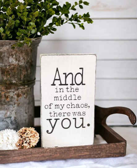 Wood block sign with black text reading 'And in the middle of chaos there was you' against a white background, ideal as a best friend gift