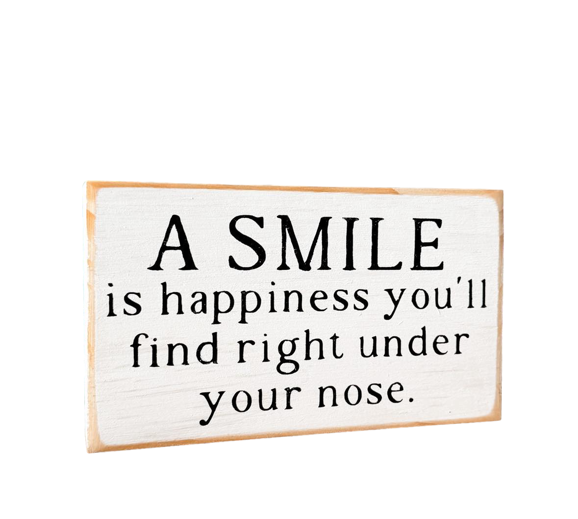 Rustic black and white wood block sign with the happiness quote 'A Smile is Happiness You'll Find Right Under Your Nose.' Ideal decor for home or office. Shop now for this uplifting gift