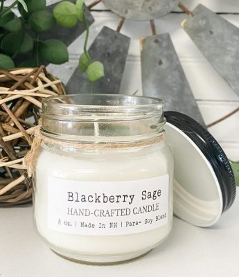 A phthalate-free Blackberry Sage Mason Jar Candle, meticulously hand-poured with high-quality 8 oz para-soy wax and fragrant oils. This captivating candle envelops your space in the refreshing scent of ripe blackberries and aromatic sage, creating a serene and inviting atmosphere in your home.