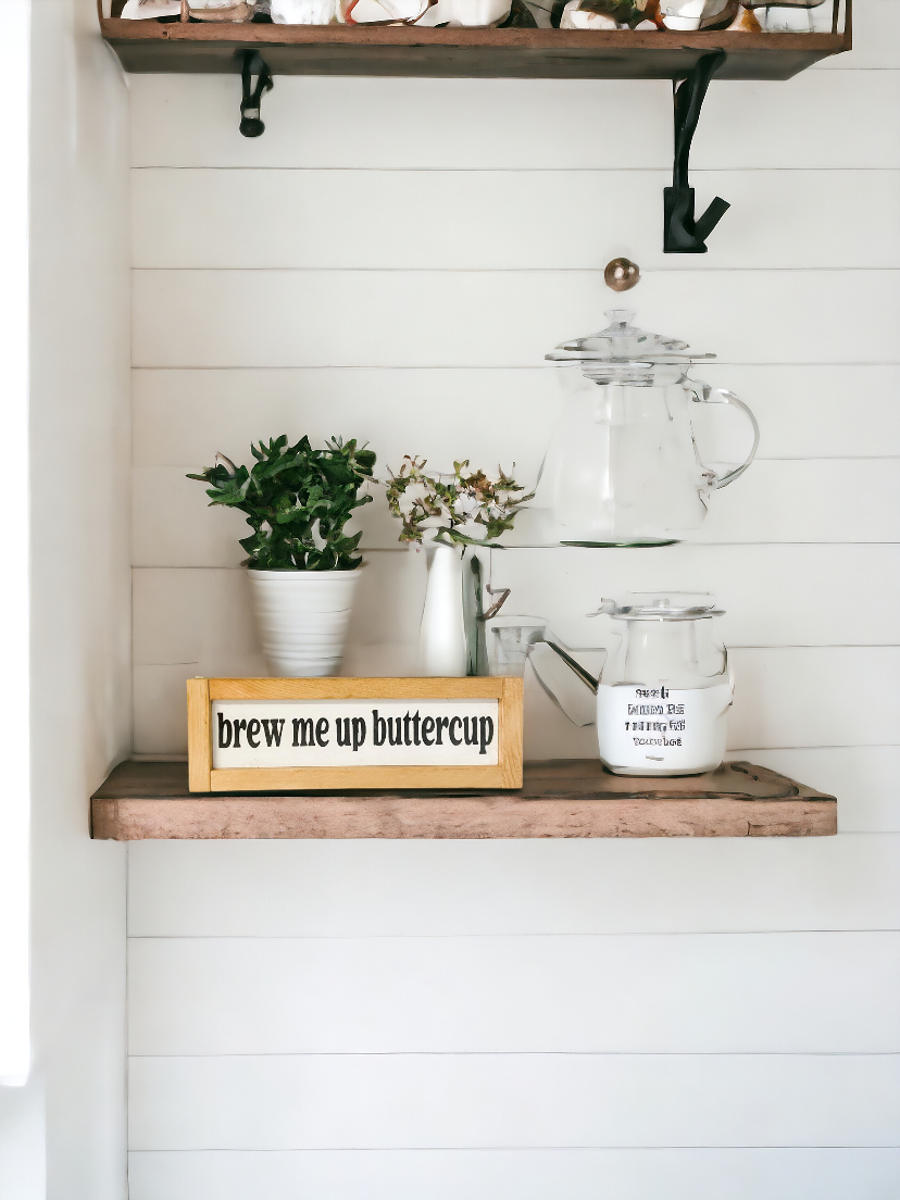 13.5" x 2.5" wooden sign with a stained wood frame, white background, and black text that reads 'Brew Me Up, Buttercup.