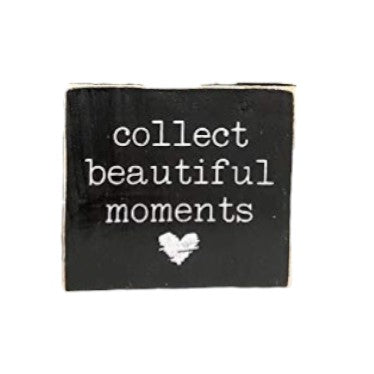 4.5" x 4.5" wooden block sign with white text 'Collect Beautiful Moments' on black background, featuring a white heart. Perfect for home or office décor.