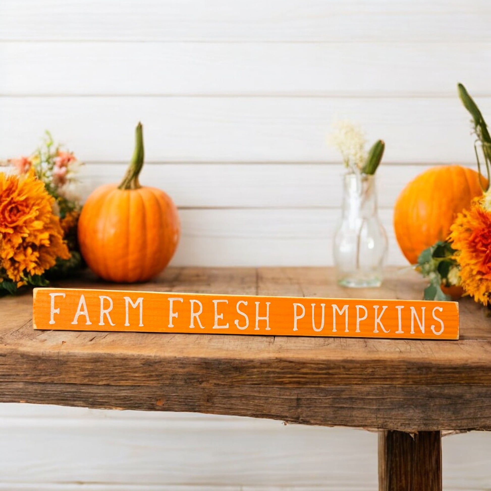 Hand-painted orange wood sign with white text reading 'Hello Pumpkin' - perfect fall decor for mantels, shelves, and tabletops.