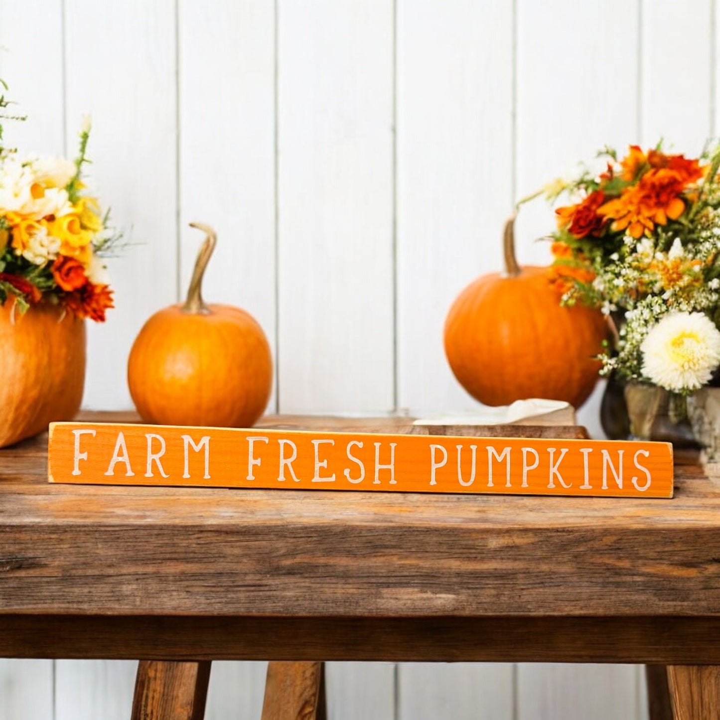 Hand-painted orange wood sign with white text reading 'Hello Pumpkin' - perfect fall decor for mantels, shelves, and tabletops.