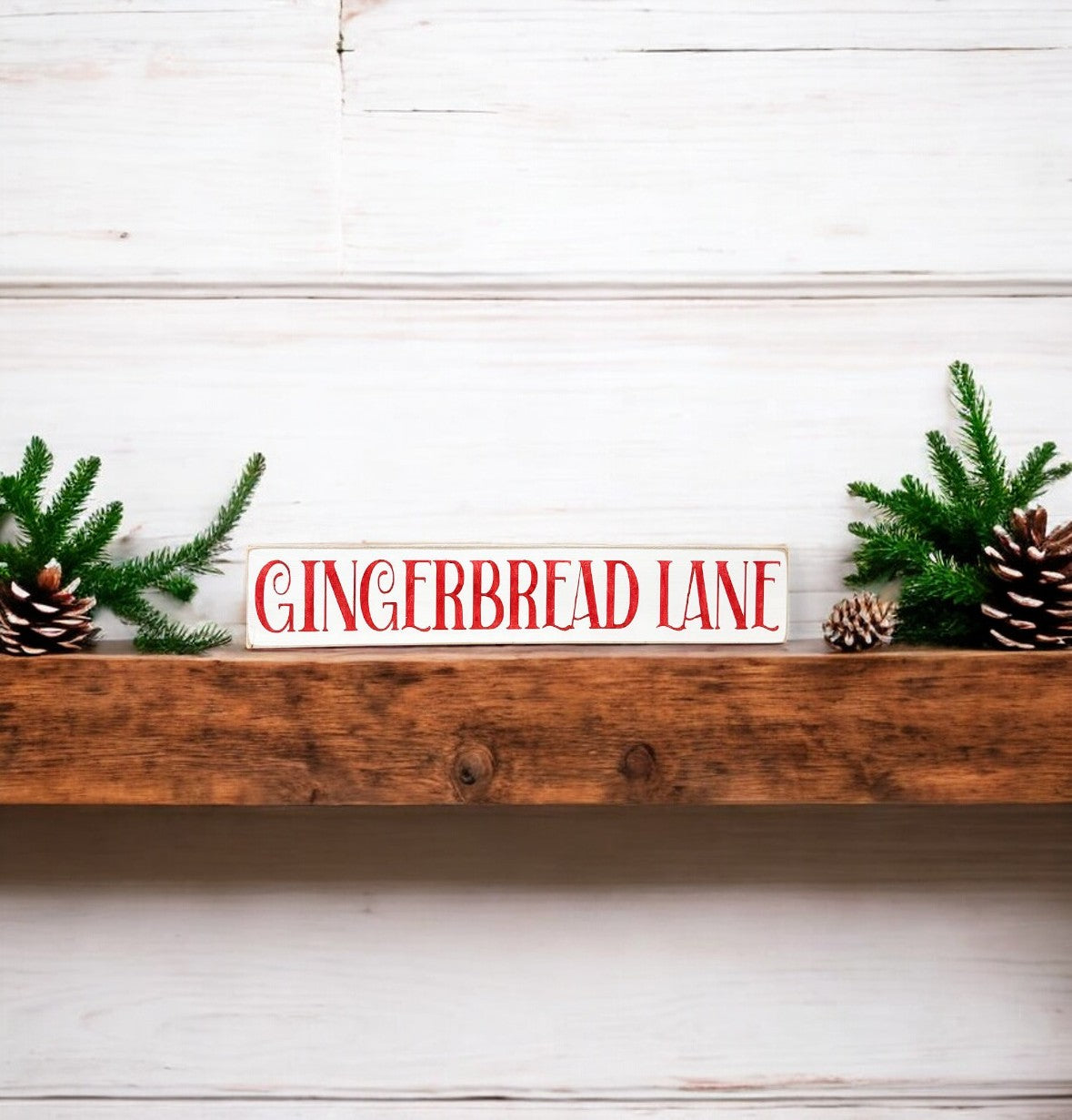 Handpainted "Gingerbread Lane" skinny wood sign in white with red nostalgic Christmas font, perfect for gingerbread decorations in the kitchen or dining room.