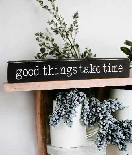 Good Things Take Time" wood sign in black and white, measuring 2" x 14", ideal for office shelf display or thoughtful gift.