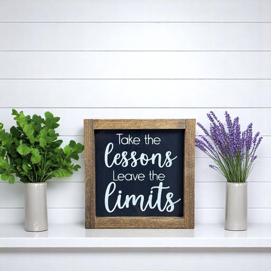 Framed wood sign that reads “Take the lessons, leave the limits” – inspirational quote for graduate and dorm decor gift
