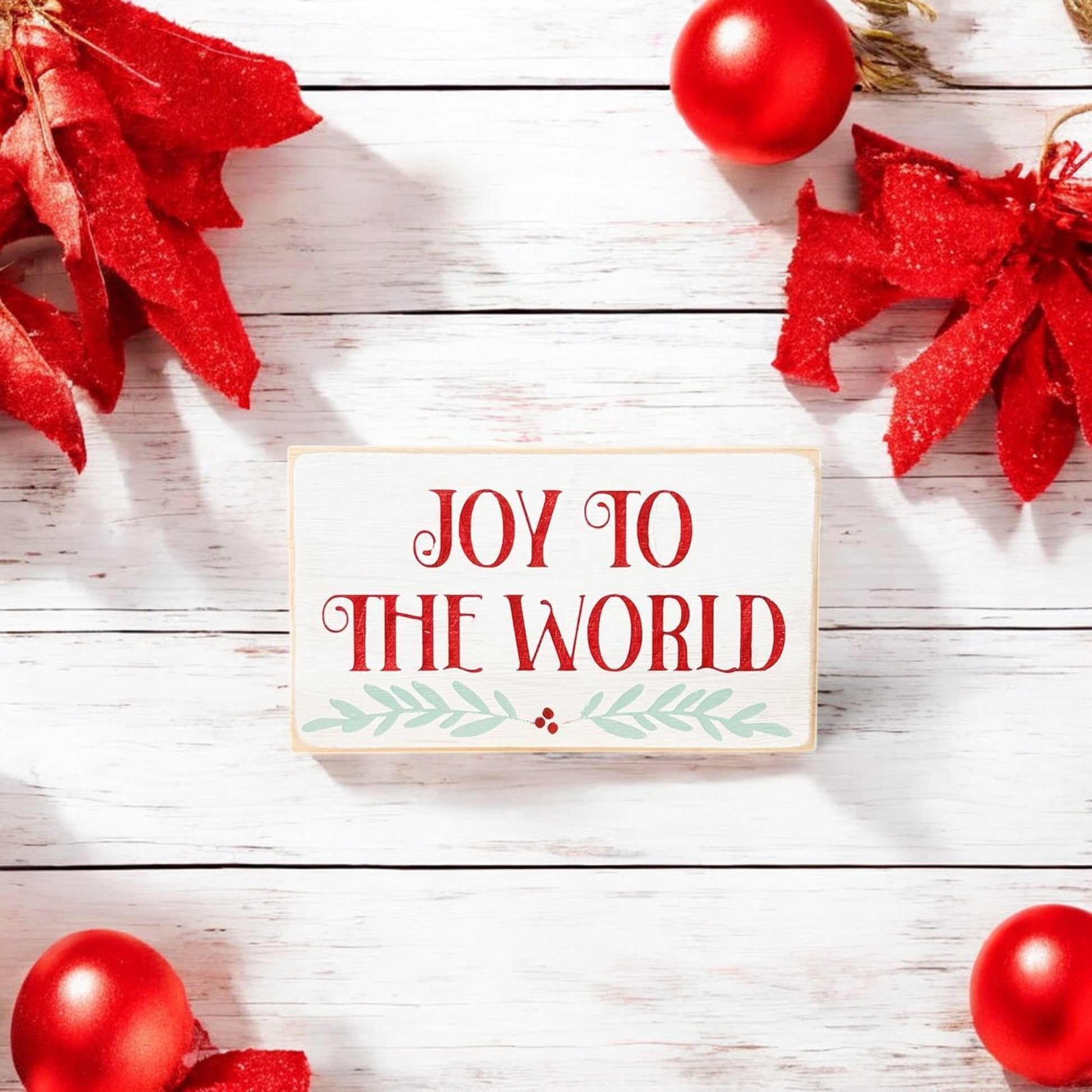 3.5" x 6" wood block sign reading "Joy to the World," perfect for holiday mantel or shelf display.