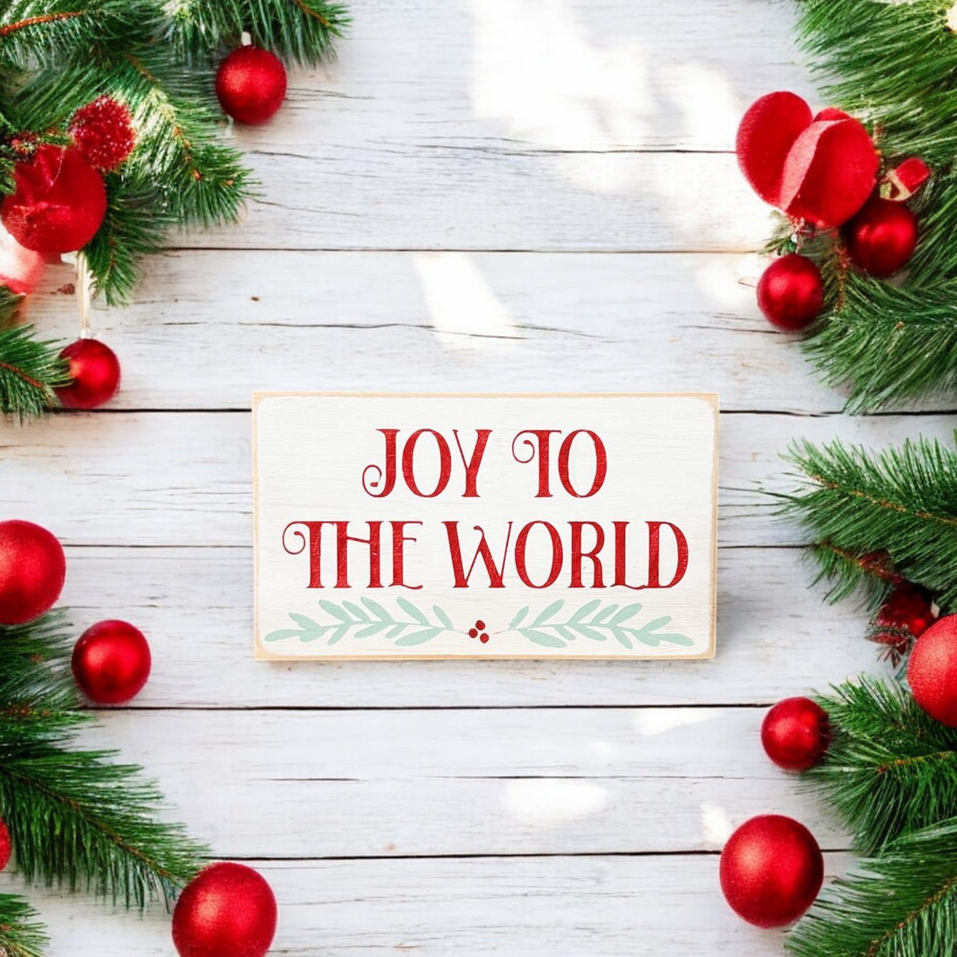 3.5" x 6" wood block sign reading "Joy to the World," perfect for holiday mantel or shelf display.