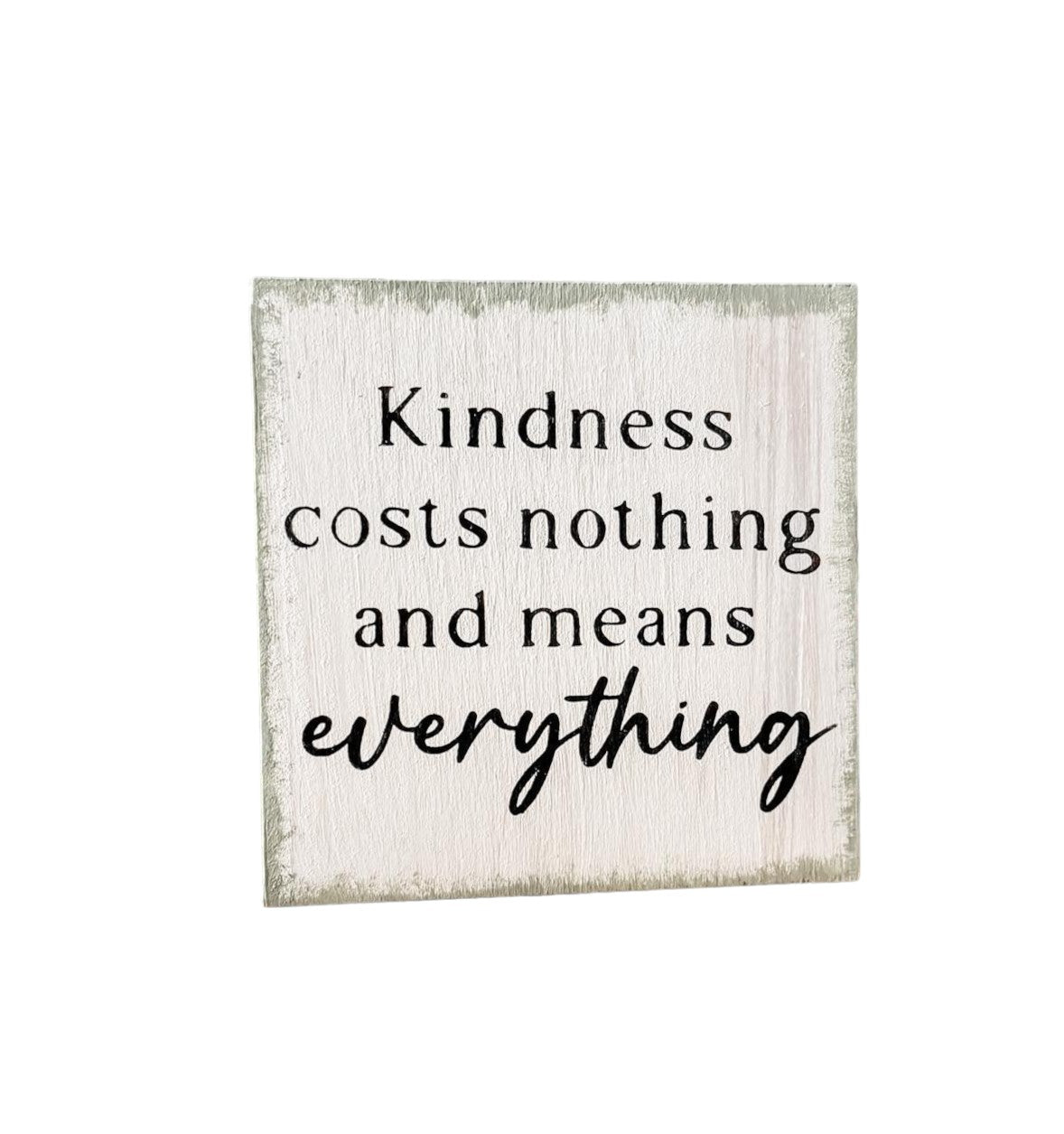 Kindness Costs Nothing and Means Everything" Wood Sign: Hand-painted black text on white background with sage green border, 4.5" x 4.5". Inspirational decor for any room.