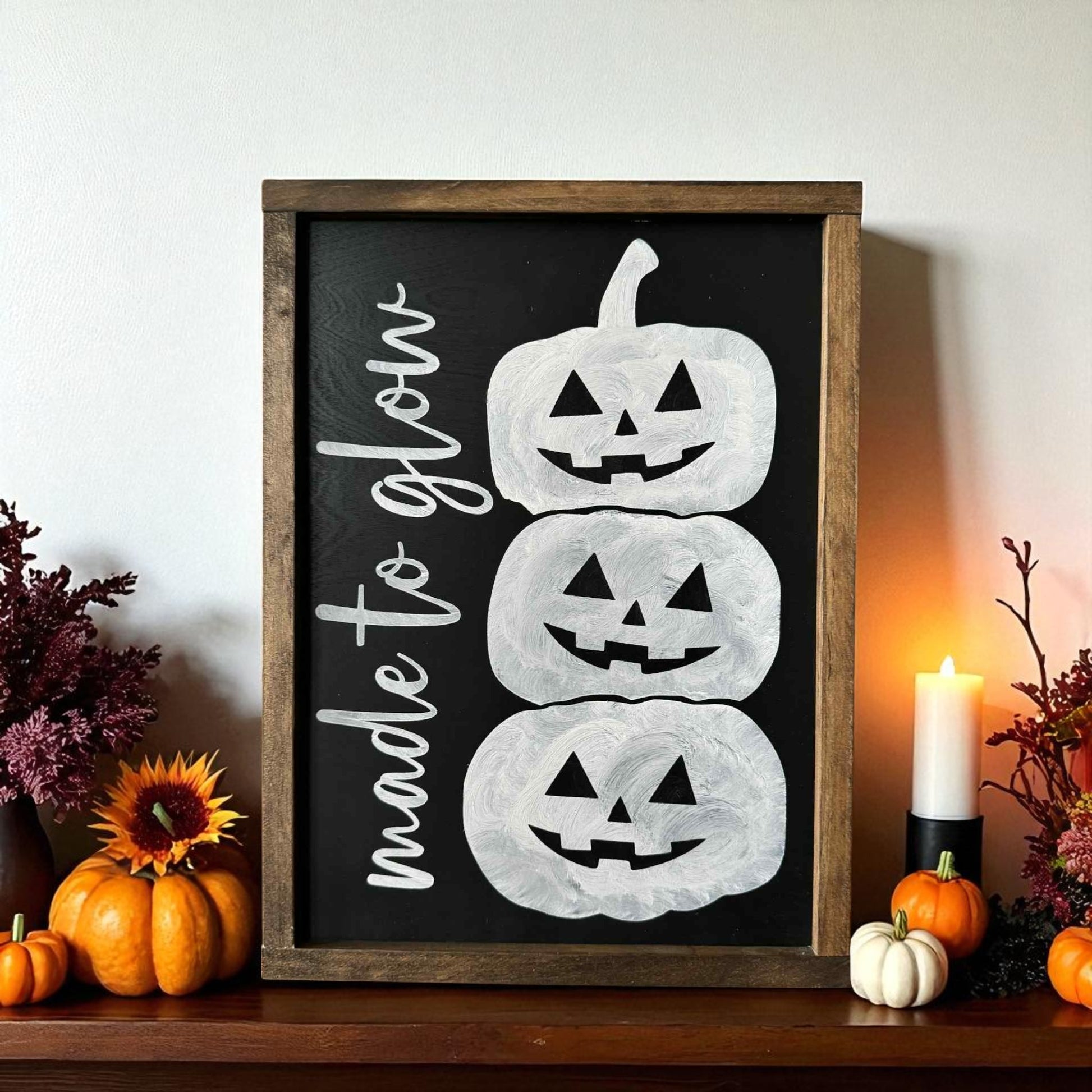 Framed wood Halloween sign with stacked jack-o’-lanterns and Made to Glow text – cute rustic Halloween decoration