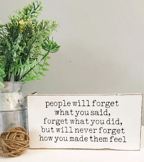 Image: 4"x8" Inspirational Wood Sign with black text on white background, saying 'People will forget what you said, forget what you did, but never how you made them feel.' Ideal appreciation gift for lasting impressions.