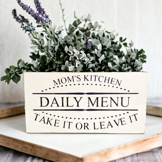 Kitchen Rules wooden sign with humorous text, perfect for Mom's culinary domain. Measures 4" x 8"
