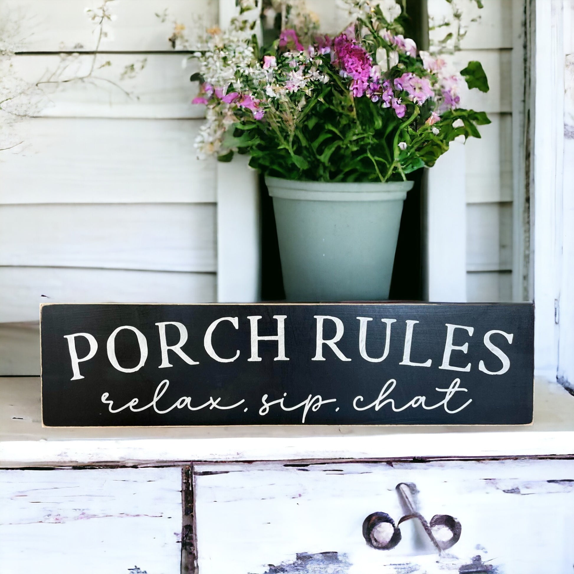 Black wooden porch rules sign that says “Relax, Sip, Chat” – handcrafted housewarming gift idea