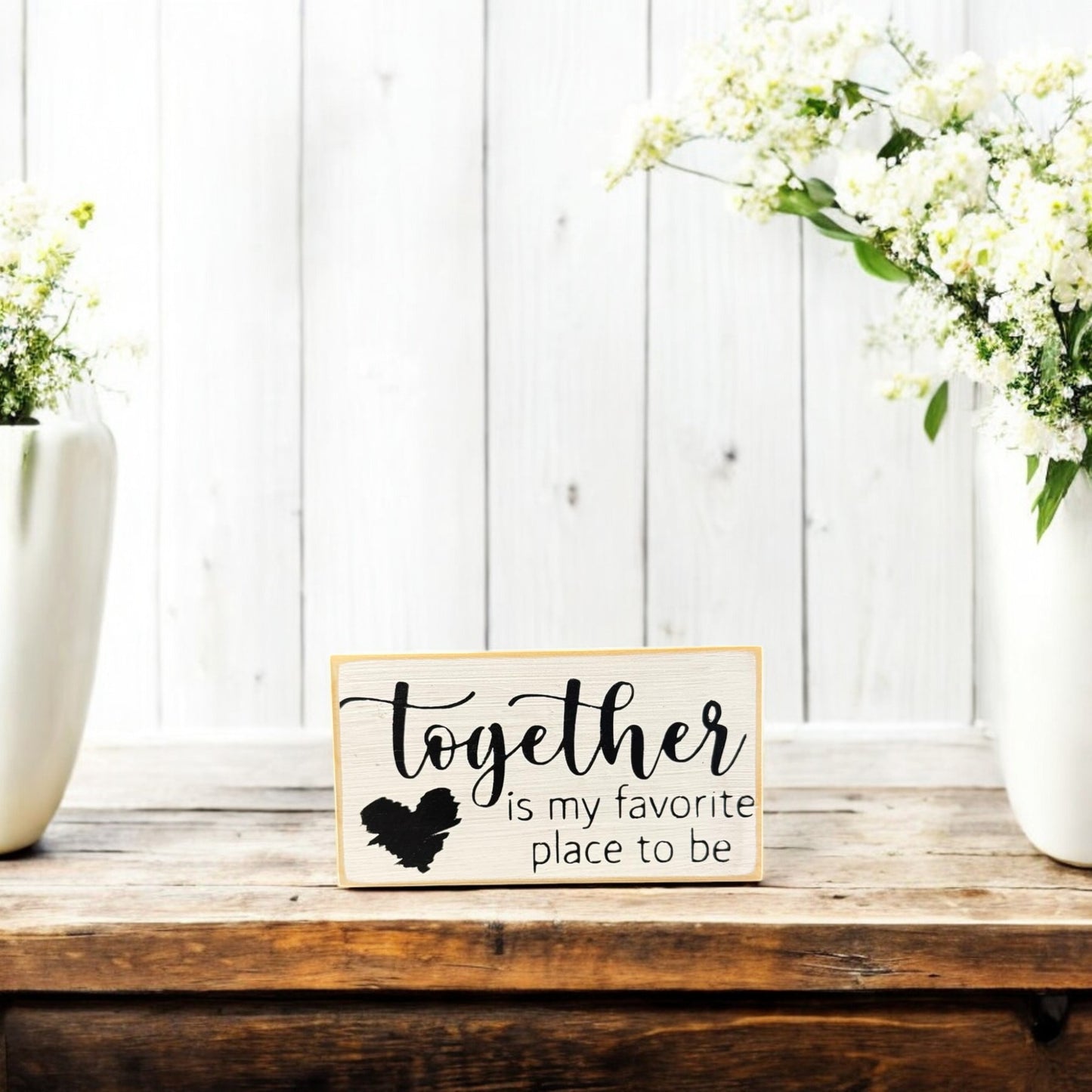 Small rustic wood sign reading 'Together Is My Favorite Place To Be,' hand-painted white with black text, ideal for couples gifts.