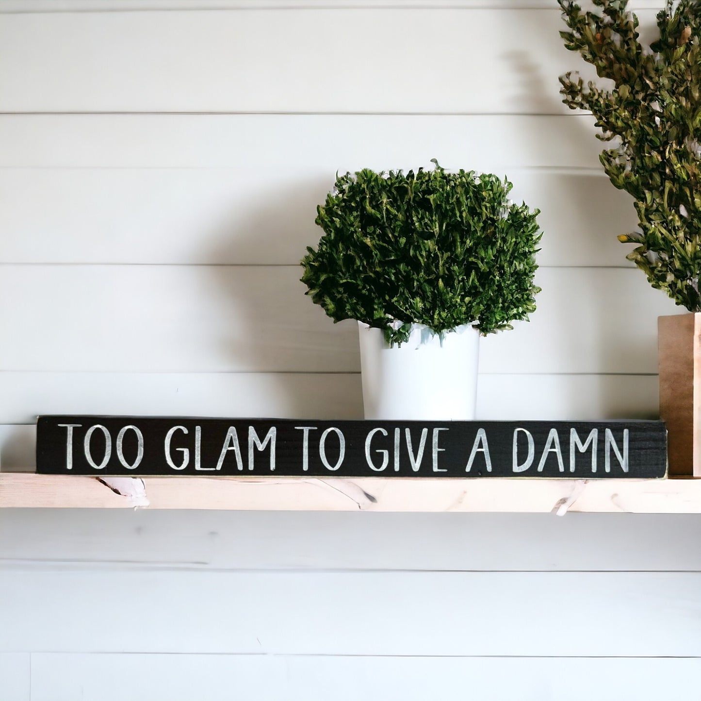 Handpainted black wood sign with white text reading 'Too Glam To Give A Damn,' freestanding 16-inch sarcastic decor for female office or home.