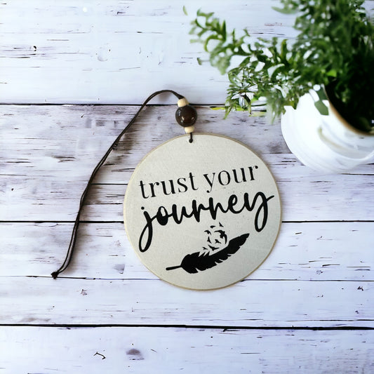 4-inch wooden car charm reading 'Trust the Journey' with black text, perfect decor for car.