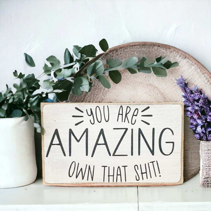 Crisp white wood block sign with empowering 'You Are Amazing' quote in bold black text, ideal for inspiring women.